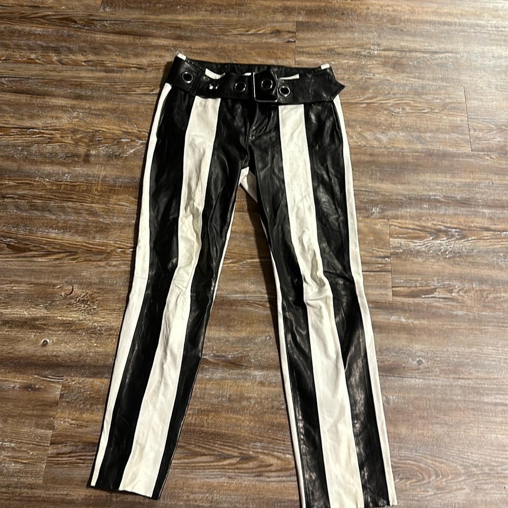 Women’s black-and-white striped leather pants
